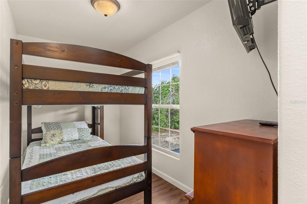 6287 North Crew Terrace Hernando, FL 34442 - Photo 29 of 38 a bedroom with a bed and a window