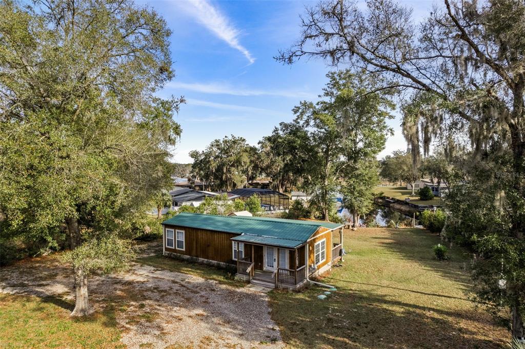 6287 North Crew Terrace Hernando, FL 34442 - Photo 5 of 38 a view of a house with a tree