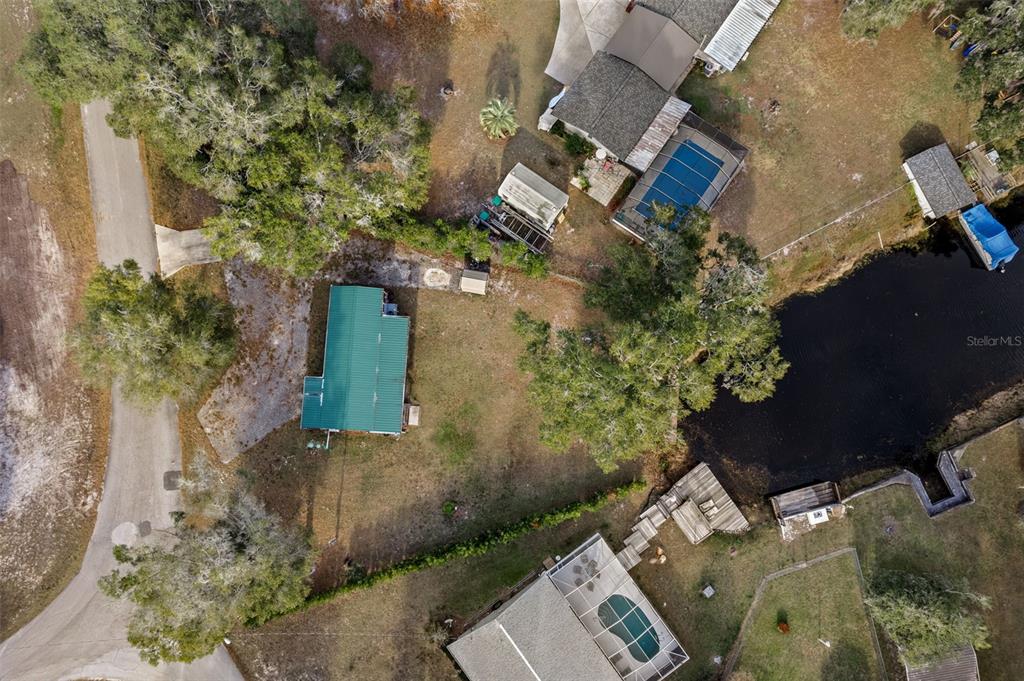 6287 North Crew Terrace Hernando, FL 34442 - Photo 6 of 38 an aerial view of a house with a yard