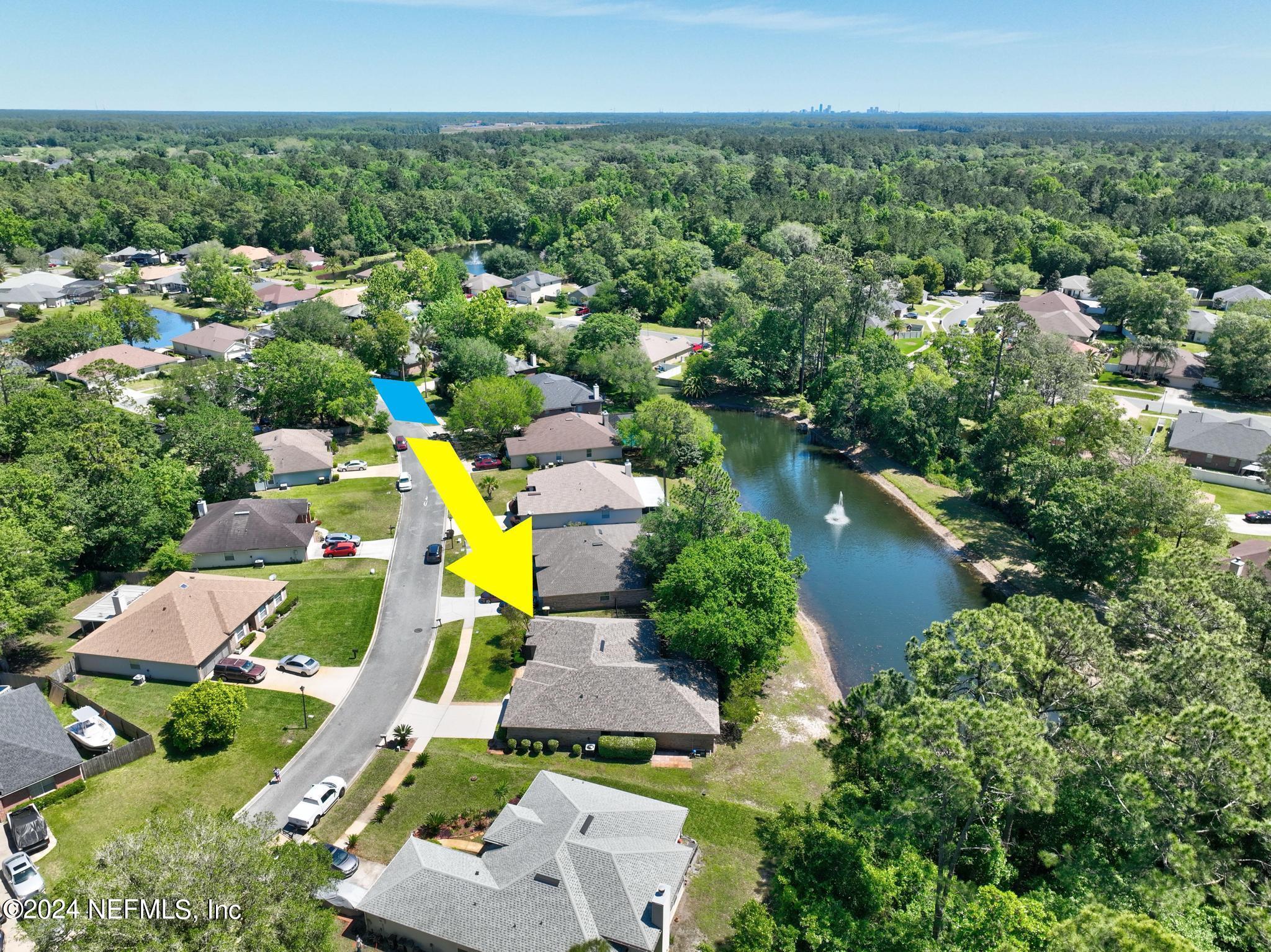 2949 Turning Leaf Lane Jacksonville, FL 32221 - Photo 112 of 116 an aerial view of a house with a swimming pool yard and outdoor seating