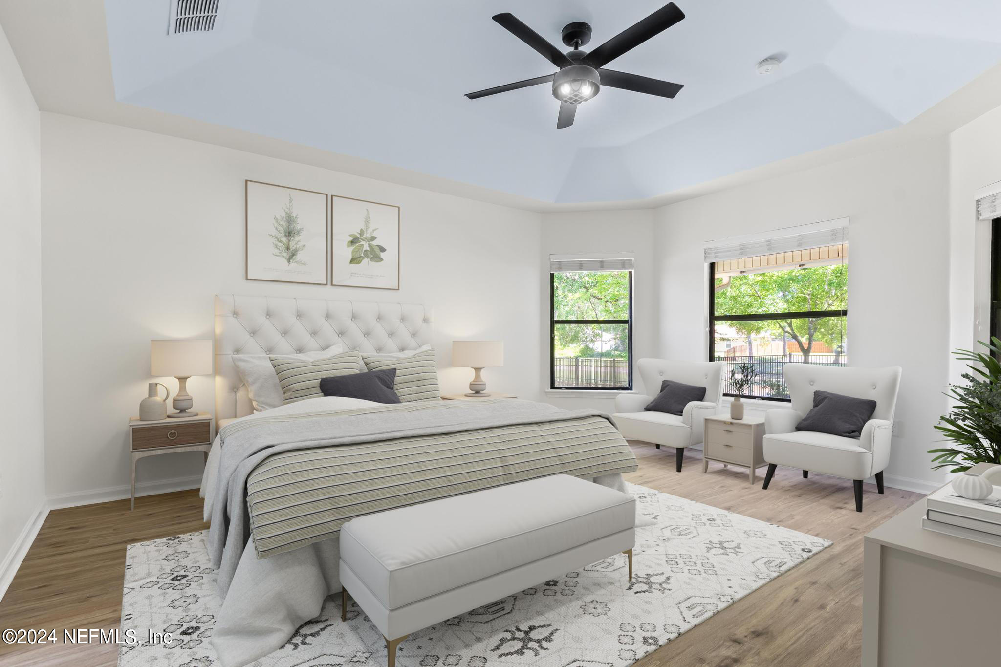 2949 Turning Leaf Lane Jacksonville, FL 32221 - Photo 58 of 116 a bedroom with a large bed and a couch