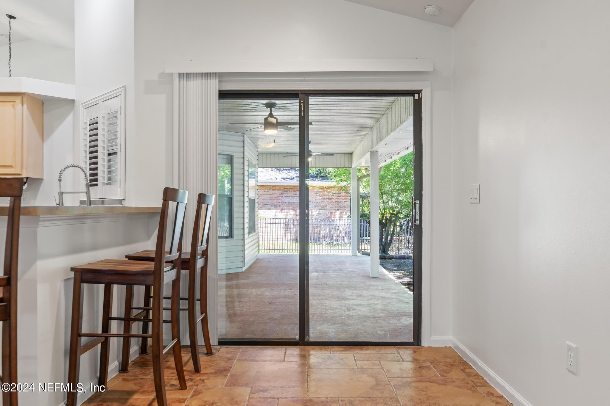 2949 Turning Leaf Lane Jacksonville, FL 32221 - Photo 93 of 116 a dining room with furniture and front door