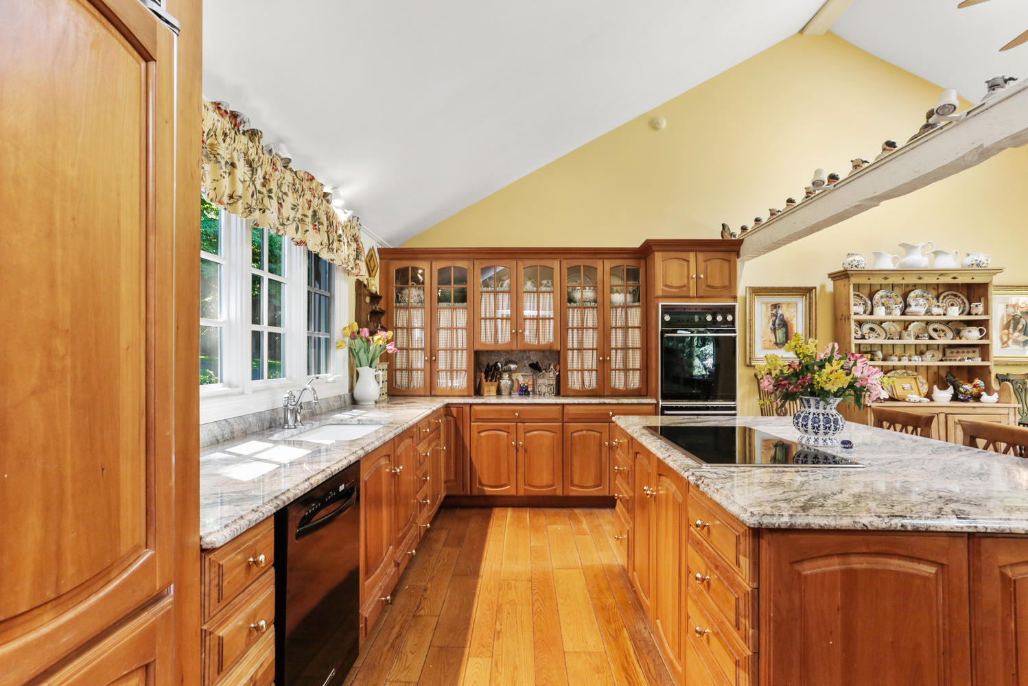 573 Valley Road New Canaan, CT 06840 - Photo 15 of 53 a kitchen with granite countertop a sink and counter space