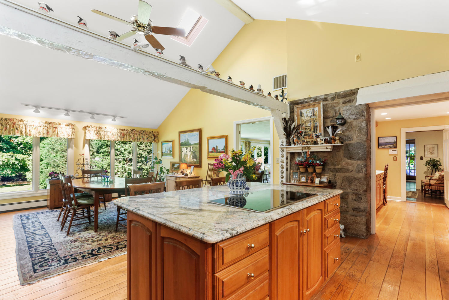 573 Valley Road New Canaan, CT 06840 - Photo 16 of 53 a kitchen with a table and chairs in it