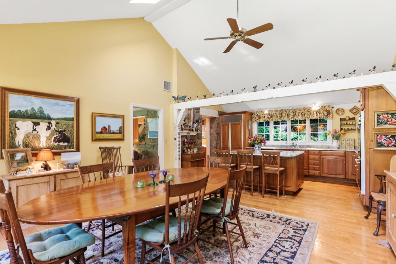573 Valley Road New Canaan, CT 06840 - Photo 17 of 53 a view of a dining room with furniture window and outside view