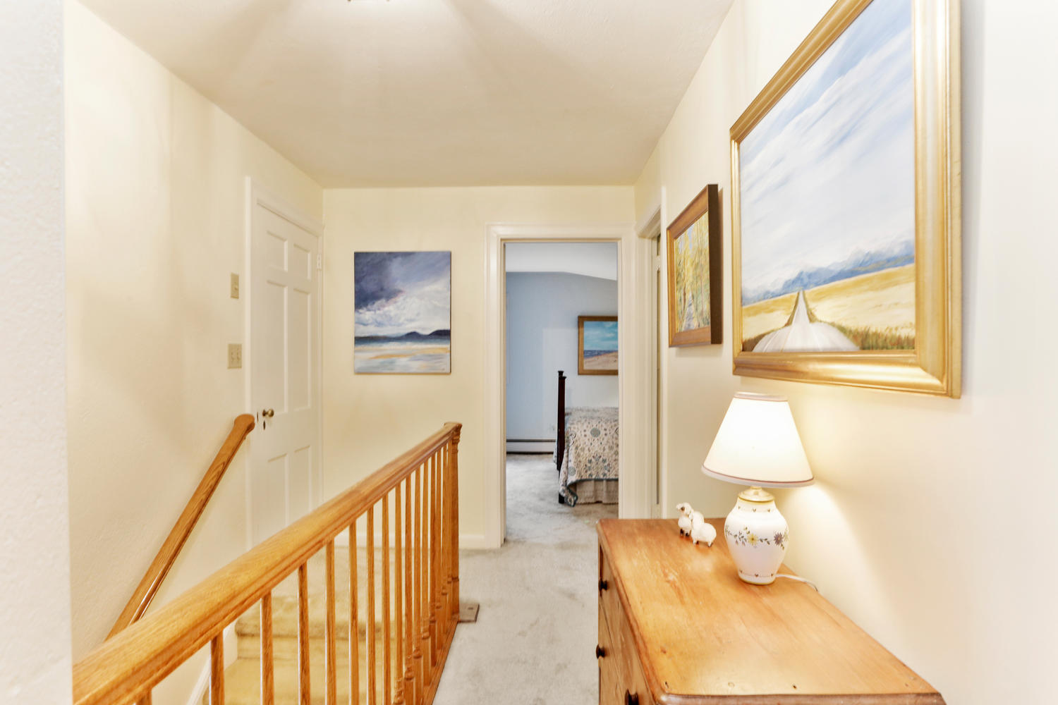 573 Valley Road New Canaan, CT 06840 - Photo 20 of 53 a bedroom with a bed and wooden floor