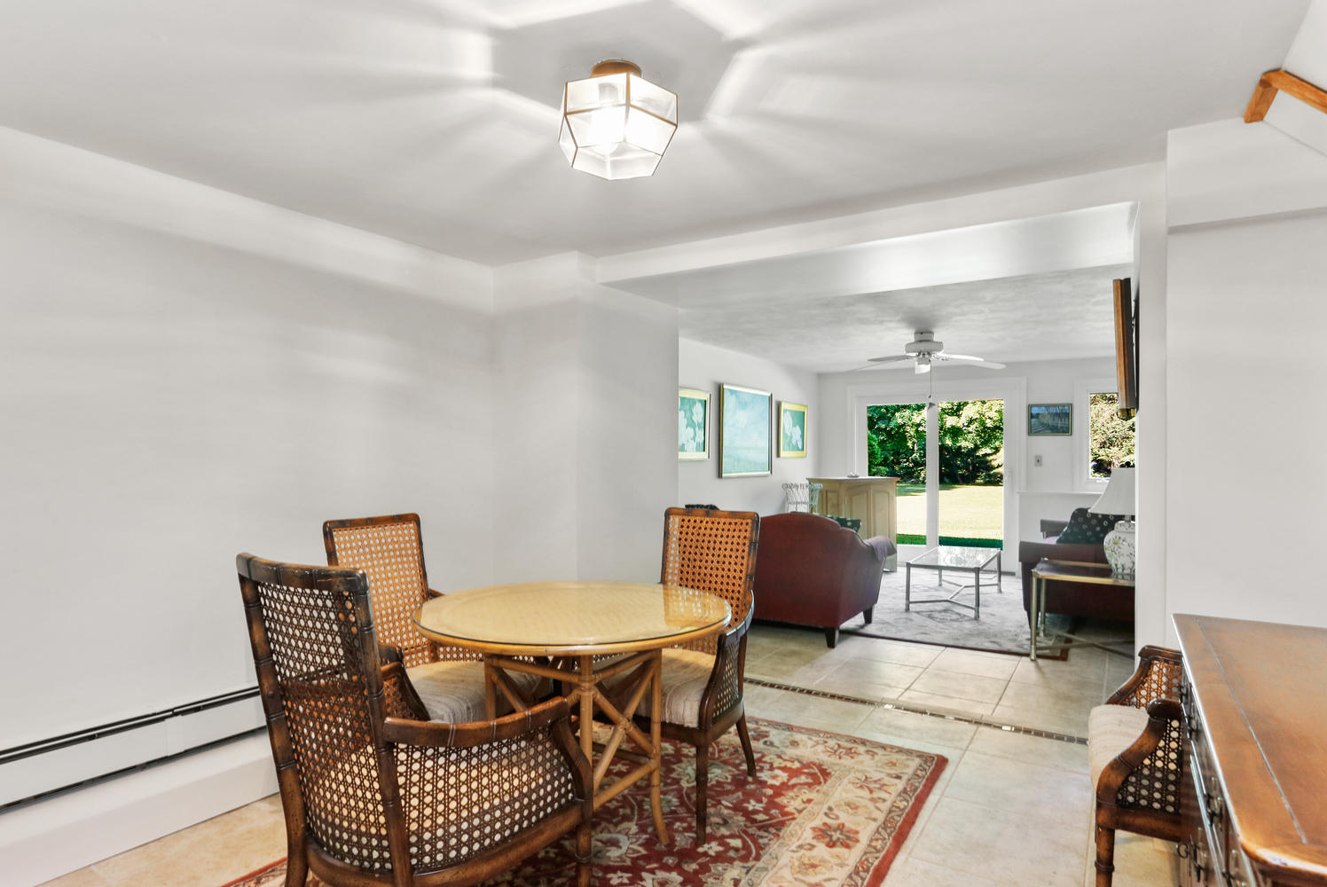 573 Valley Road New Canaan, CT 06840 - Photo 30 of 53 a view of a dining room with furniture