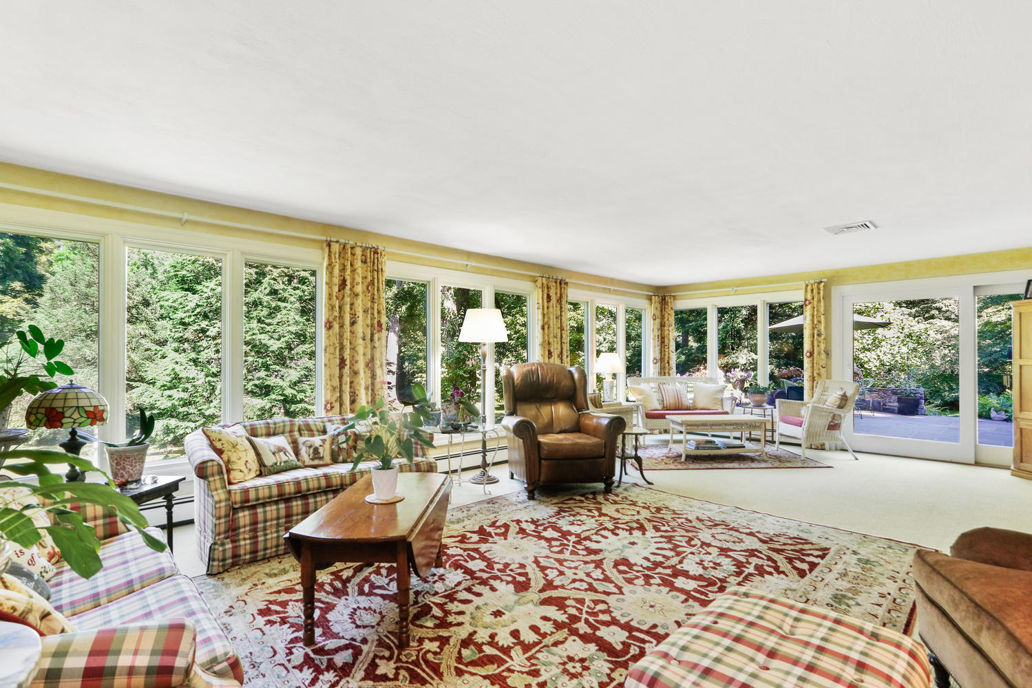 573 Valley Road New Canaan, CT 06840 - Photo 10 of 53 a living room with furniture and a large window