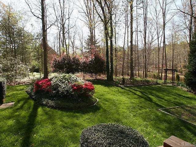 11808 Coachmans Way Raleigh, NC 27614 - Photo 10 of 12 a view of a garden