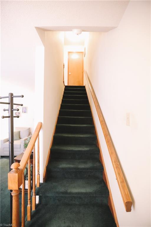 3103 Rockingham Road High Point, NC 27265 - Photo 11 of 22 Stairs lead to both bedrooms.