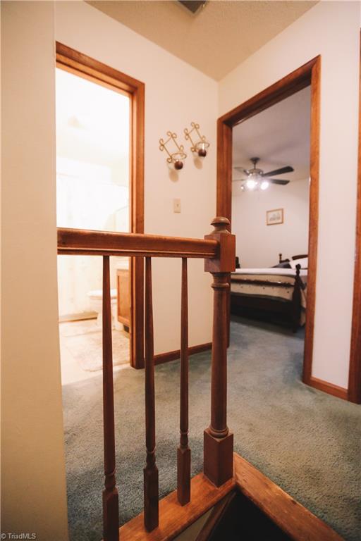3103 Rockingham Road High Point, NC 27265 - Photo 12 of 22 From stairs, master bedroom is on the left, full bath in middle, and second bedroom on the right.