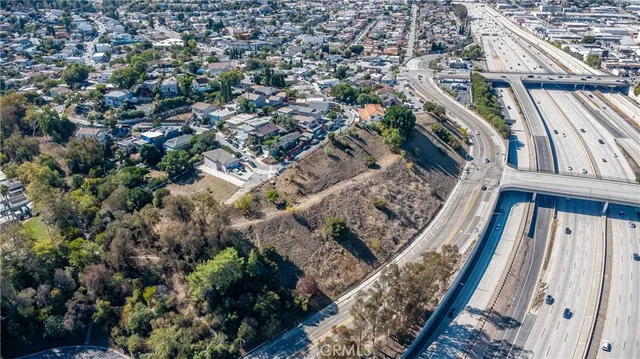 an aerial view of residential house and outdoor space