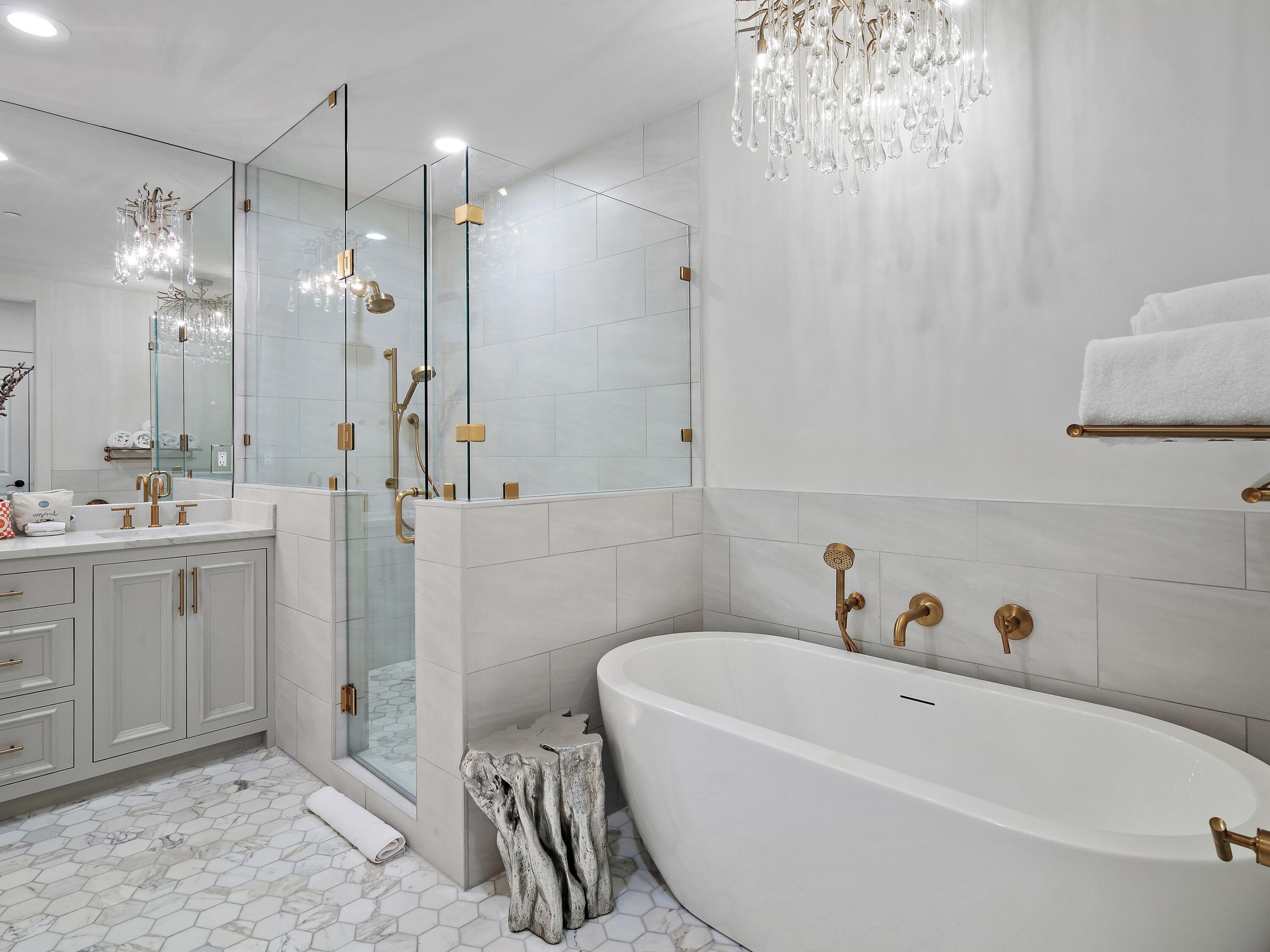 37 Compass Point Way South, Unit 421 Inlet Beach, FL 32461 - Photo 13 of 30 a bathroom with a bathtub a shower a sink and a mirror