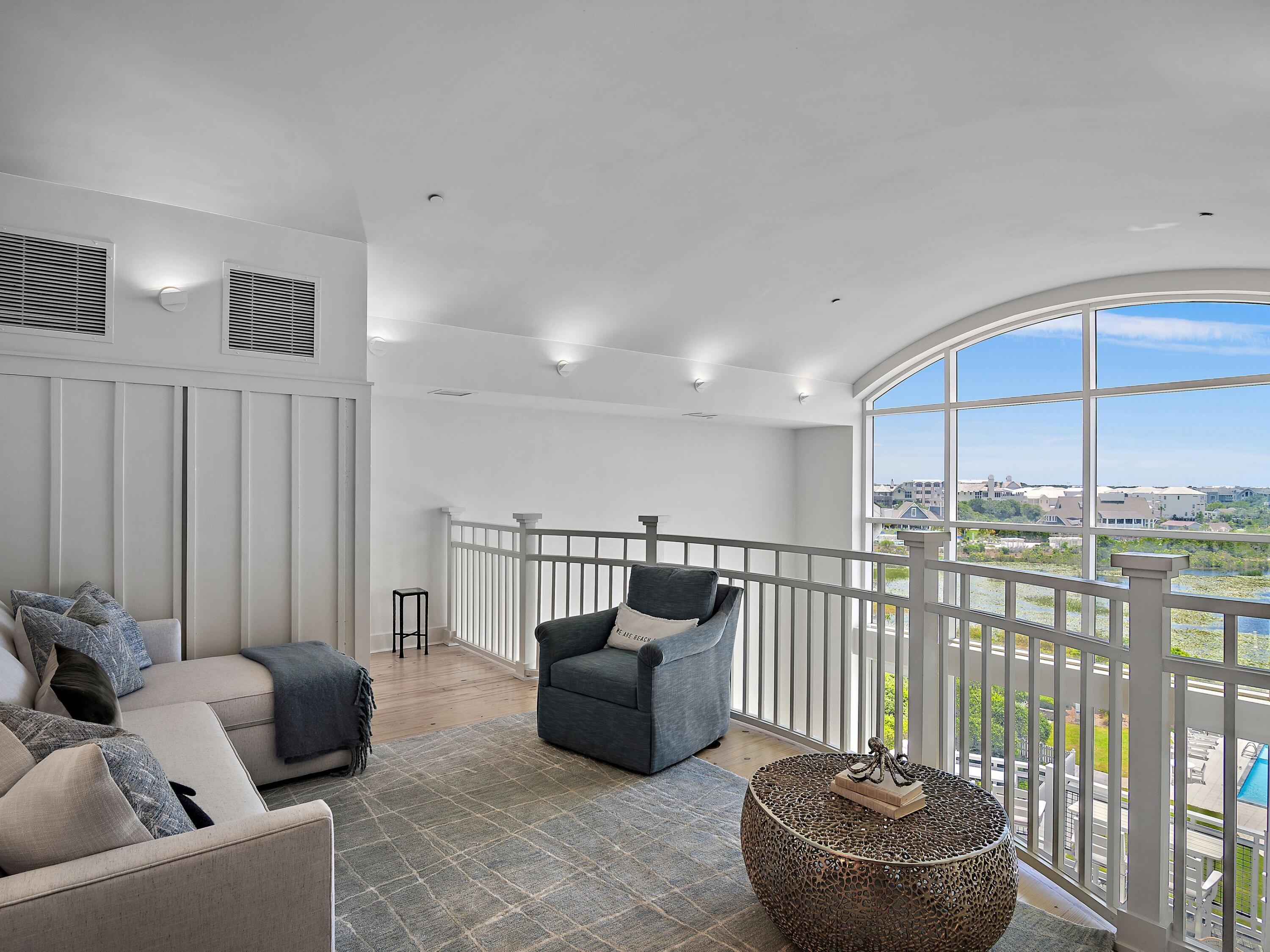 37 Compass Point Way South, Unit 421 Inlet Beach, FL 32461 - Photo 15 of 30 a living room with furniture and a potted plant