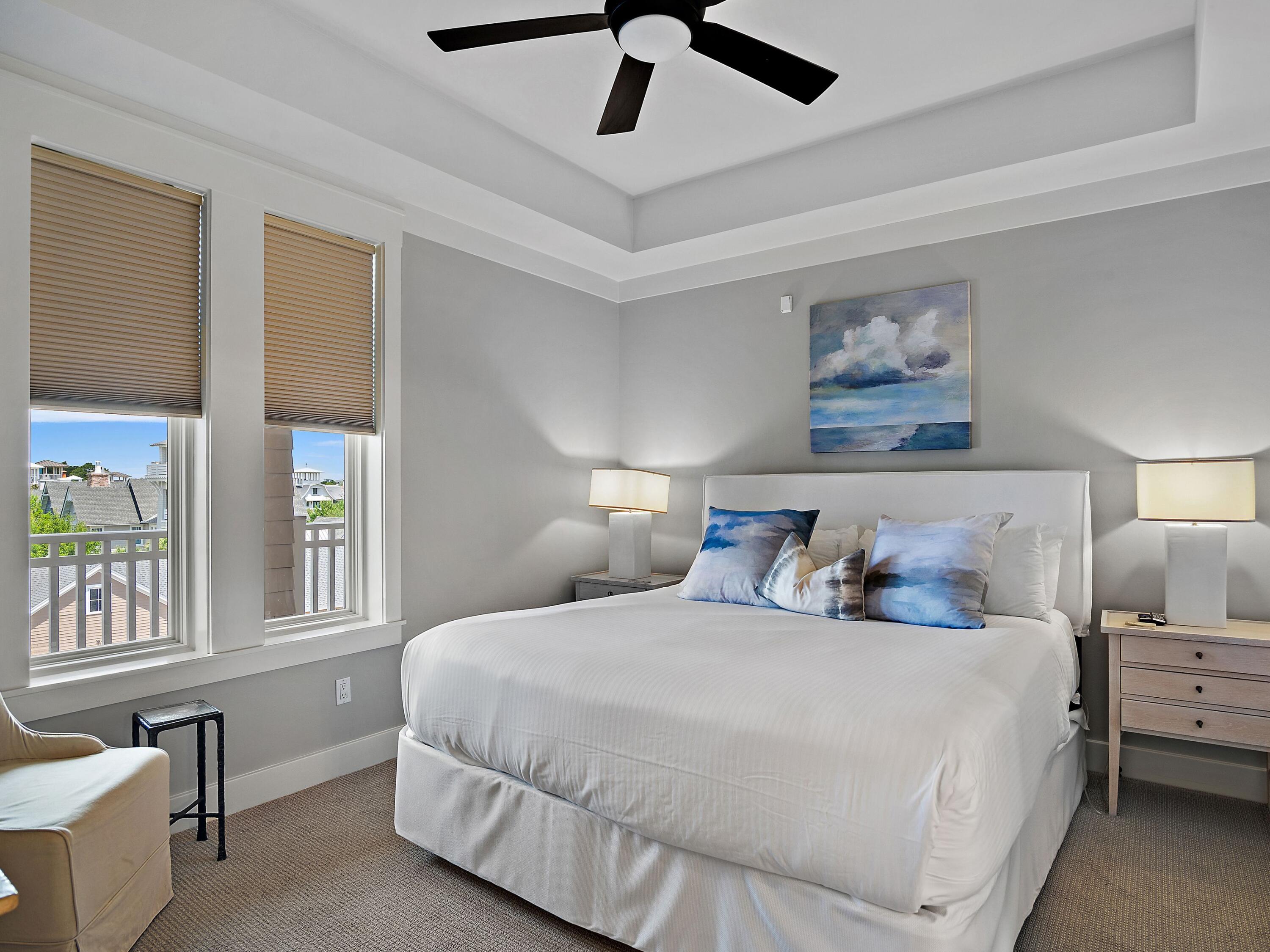 37 Compass Point Way South, Unit 421 Inlet Beach, FL 32461 - Photo 17 of 30 a bedroom with a bed and wooden floor