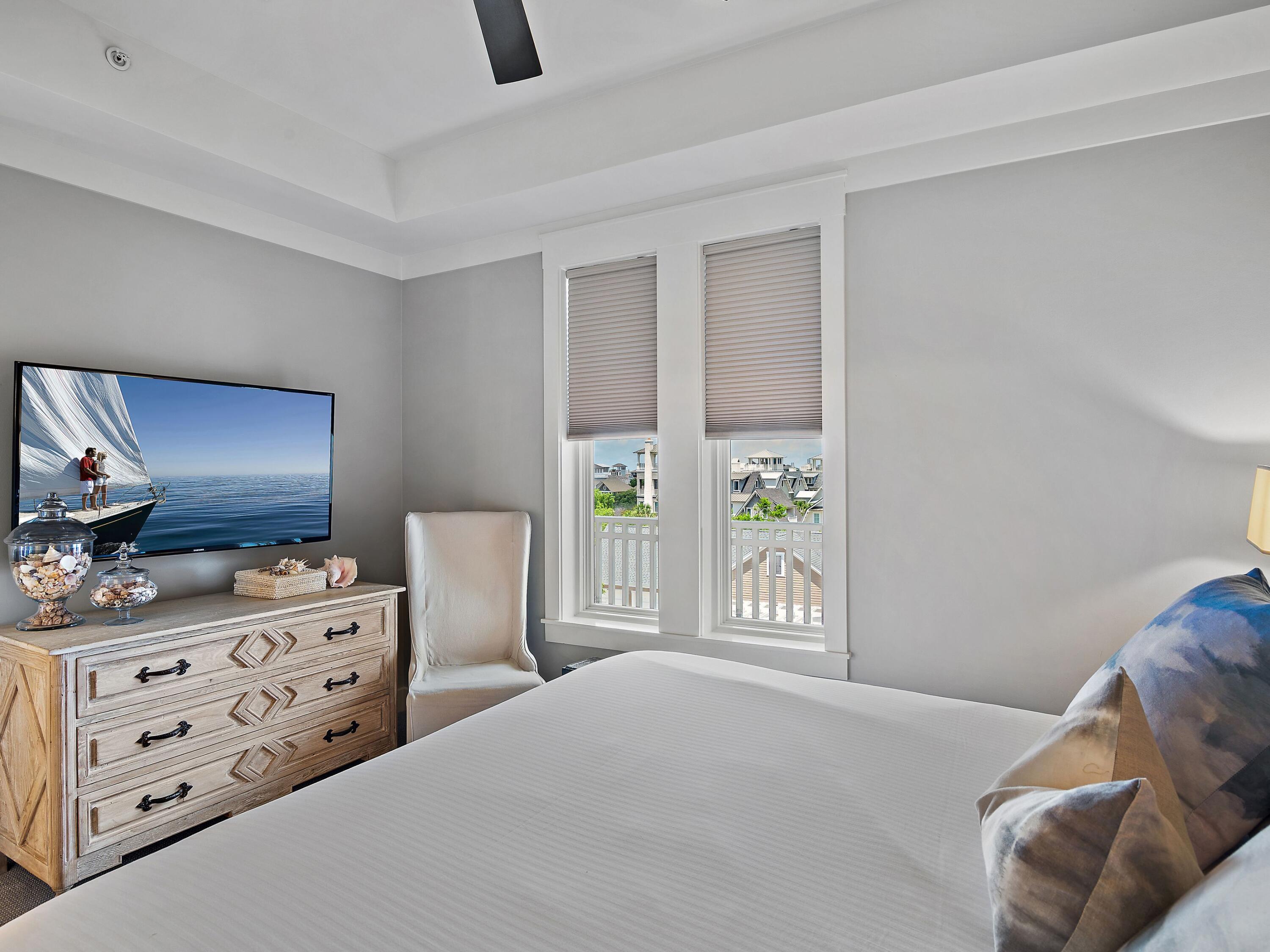 37 Compass Point Way South, Unit 421 Inlet Beach, FL 32461 - Photo 18 of 30 a bedroom with bed tv and window