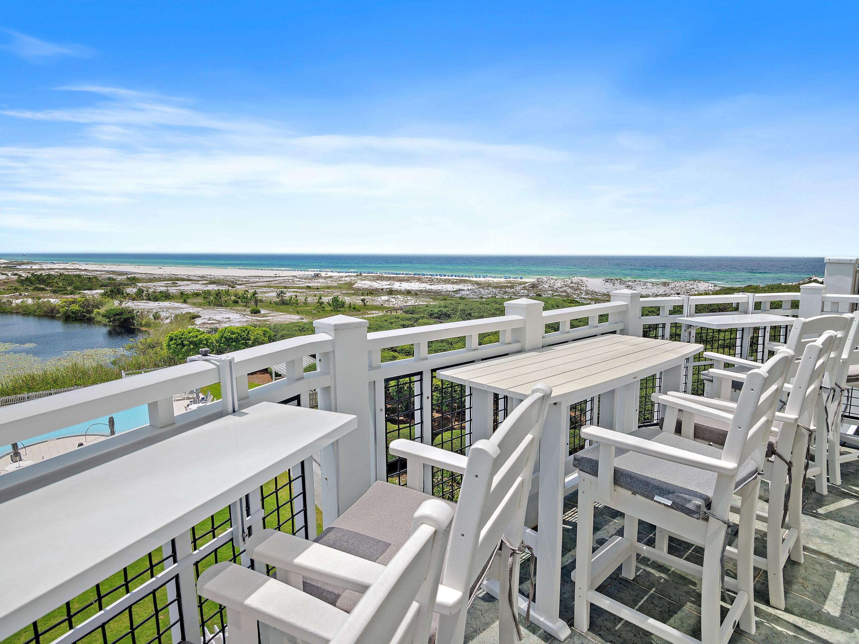 37 Compass Point Way South, Unit 421 Inlet Beach, FL 32461 - Photo 2 of 30 an aerial view of a multi story parking building with city view