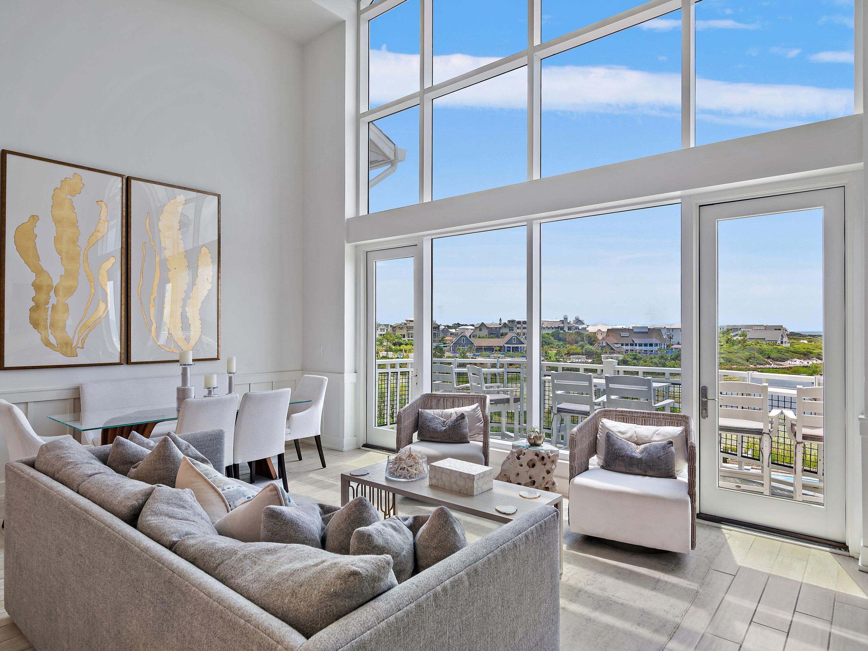 37 Compass Point Way South, Unit 421 Inlet Beach, FL 32461 - Photo 5 of 30 a living room with furniture and large windows