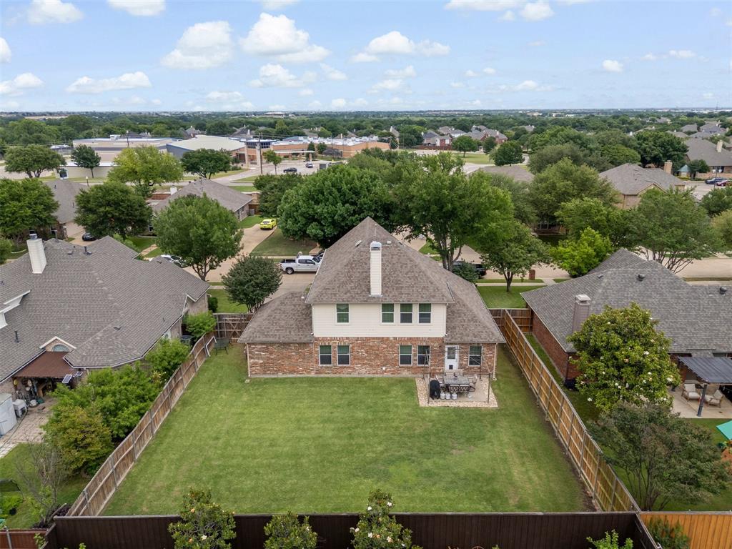 709 Paint Creek Road Murphy, TX 75094 - Photo 21 of 27 Back of House and Backyard