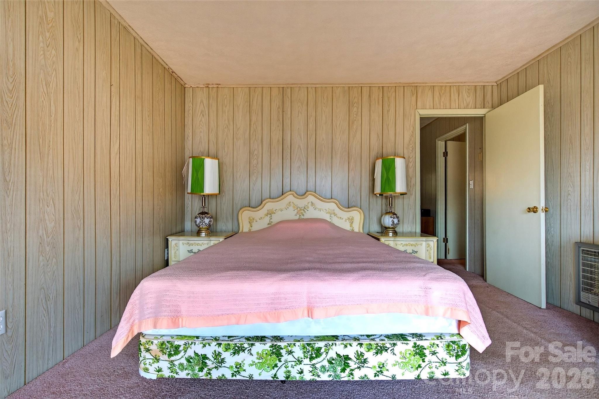 1306 Fork Mountain Road Bakersville, NC 28705 - Photo 13 of 34 a bedroom with a bed and a closet