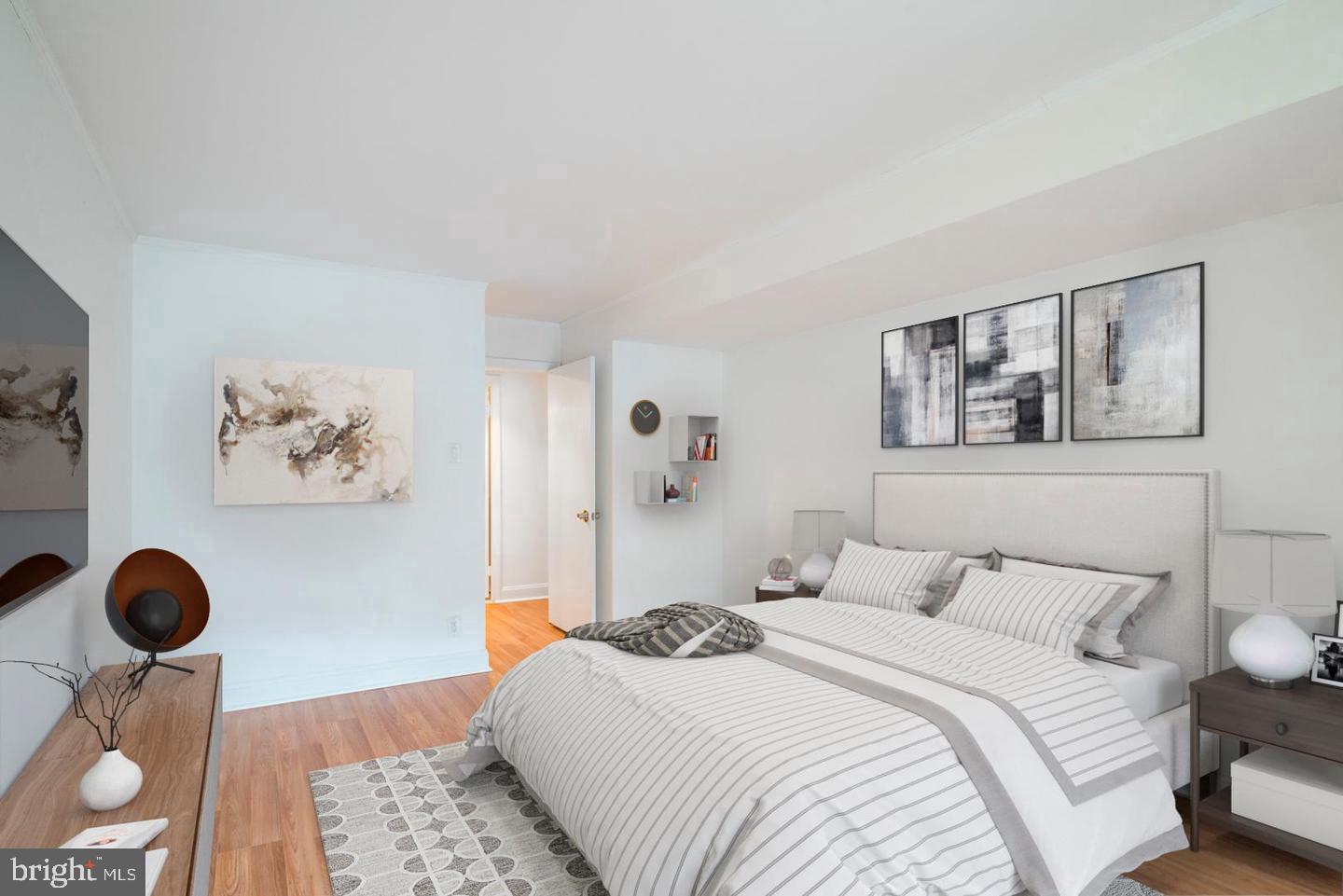 1140 23rd Street Northwest, Unit 707 Washington, DC 20037 - Photo 11 of 18 Serene bedroom with modern accents.