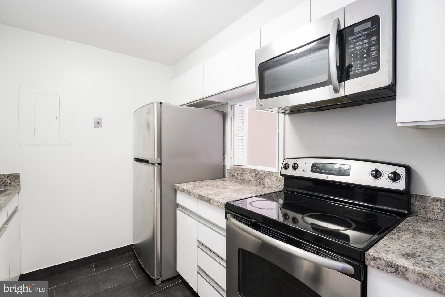1140 23rd Street Northwest, Unit 707 Washington, DC 20037 - Photo 14 of 18 Modern kitchen with sleek appliances.
