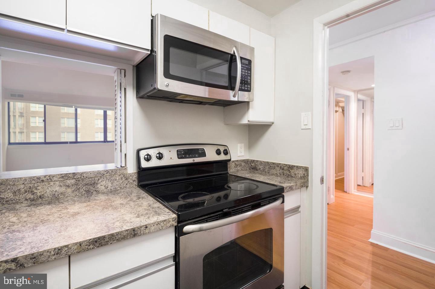 1140 23rd Street Northwest, Unit 707 Washington, DC 20037 - Photo 15 of 18 Modern kitchen with sleek appliances.