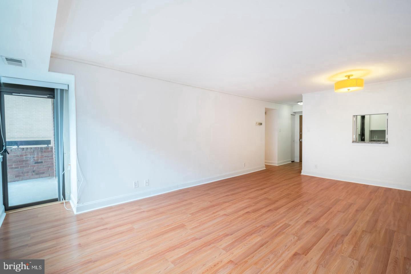 1140 23rd Street Northwest, Unit 707 Washington, DC 20037 - Photo 5 of 18 Spacious, sunlit living area awaits!