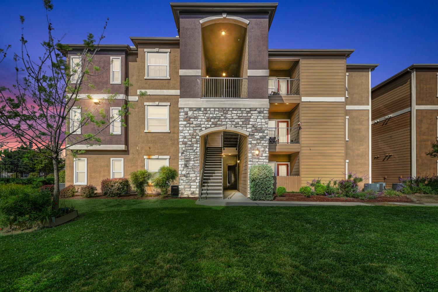 8434 Walerga Road, Unit 331 Antelope, CA 95843 - Photo 1 of 1 a front view of a house with garden