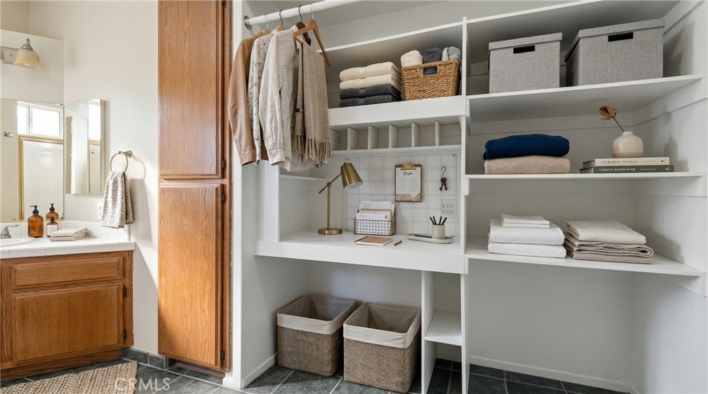 22678 Weatherly Court Wildomar, CA 92595 - Photo 21 of 54 Closet With Built-In Shelving And Organized Storage - Digitally Staged