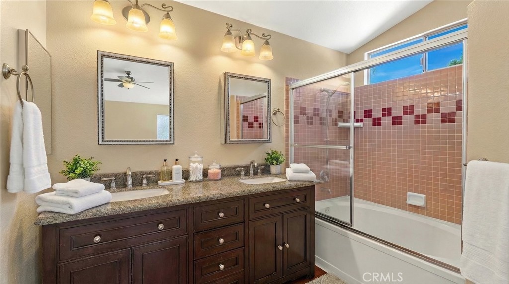 22678 Weatherly Court Wildomar, CA 92595 - Photo 29 of 54 2nd Primary Bathroom With Dual Sinks And Shower/Tub Combination - Digitally Staged