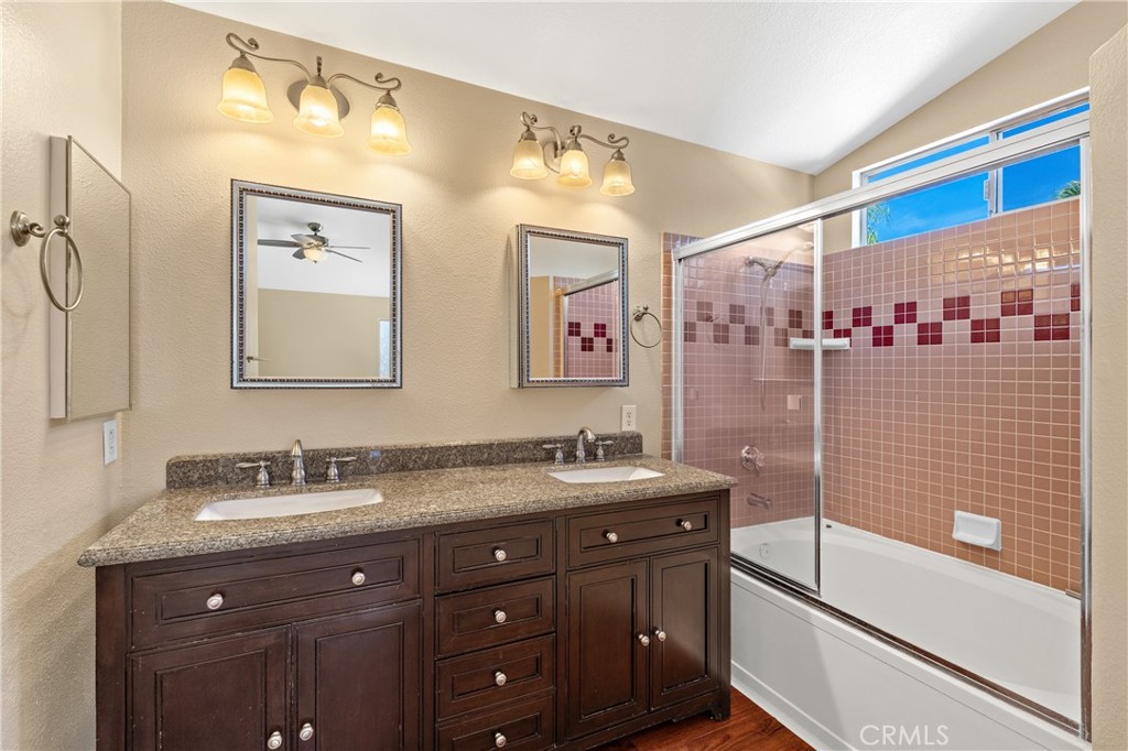 22678 Weatherly Court Wildomar, CA 92595 - Photo 30 of 54 2nd Primary Bathroom With Dual Sinks And Shower/Tub Combination
