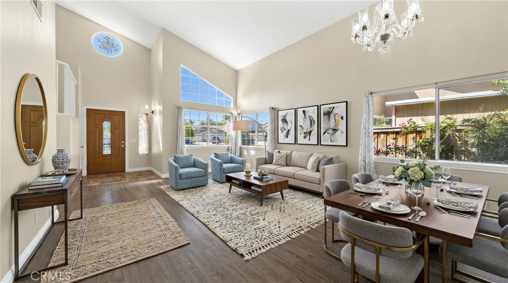 22678 Weatherly Court Wildomar, CA 92595 - Photo 3 of 54 Bright Living Room With Vaulted Ceilings, Large Windows, And Wood-Look Flooring - Digitally Staged