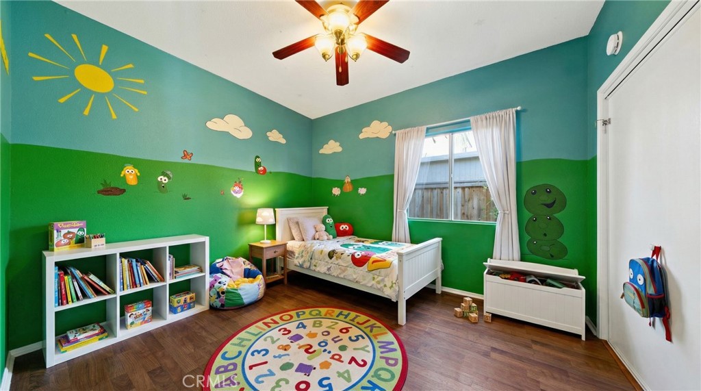 22678 Weatherly Court Wildomar, CA 92595 - Photo 36 of 54 DOWNSTAIRS Bright And Cheerful Bedroom With Custom Mural - Digitally Staged