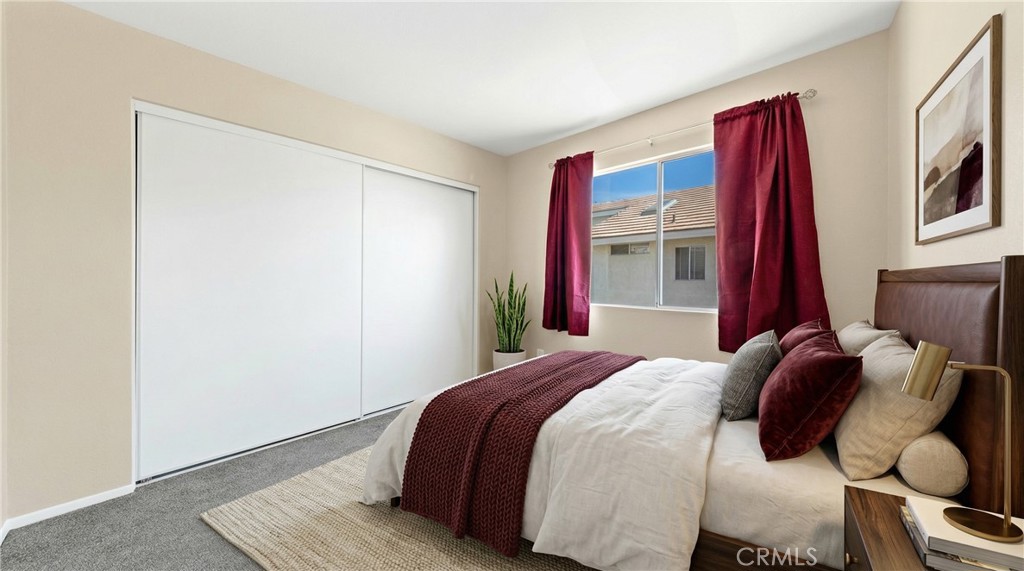 22678 Weatherly Court Wildomar, CA 92595 - Photo 37 of 54 Upstairs Bedroom With Window, Natural Light, And Closet Space - Digitally Staged