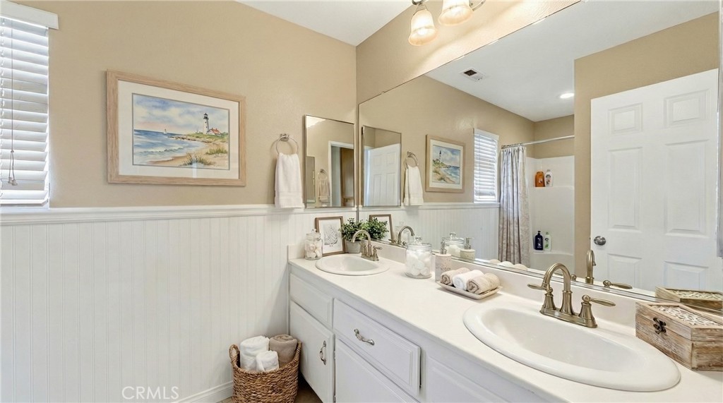 22678 Weatherly Court Wildomar, CA 92595 - Photo 39 of 54 Bathroom With Dual Sinks And Updated Fixtures - Digitally Staged