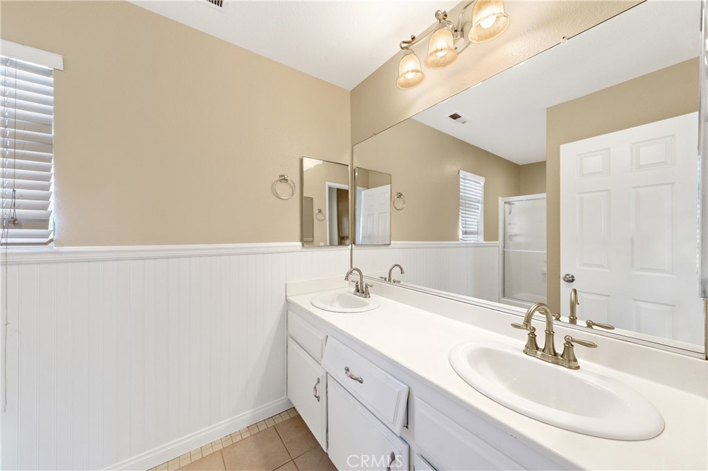22678 Weatherly Court Wildomar, CA 92595 - Photo 40 of 54 Bathroom With Dual Sinks And Updated Fixtures