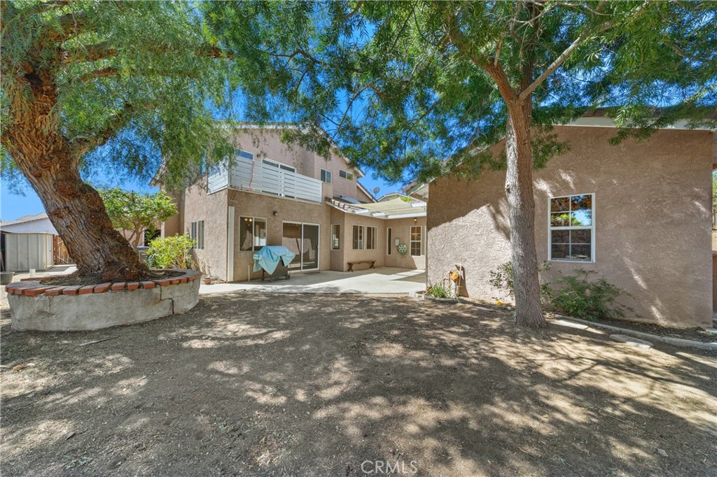 22678 Weatherly Court Wildomar, CA 92595 - Photo 43 of 54 Backyard With Mature Trees Providing Shade And Privacy