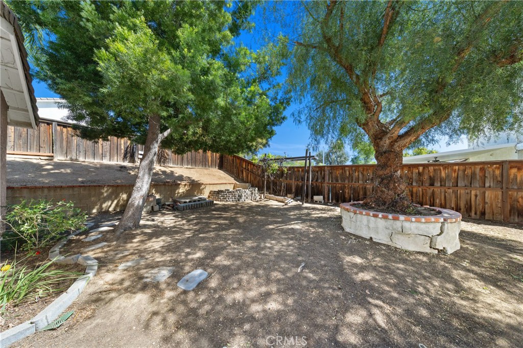 22678 Weatherly Court Wildomar, CA 92595 - Photo 46 of 54 Spacious Backyard With Mature Landscaping And Open Space
