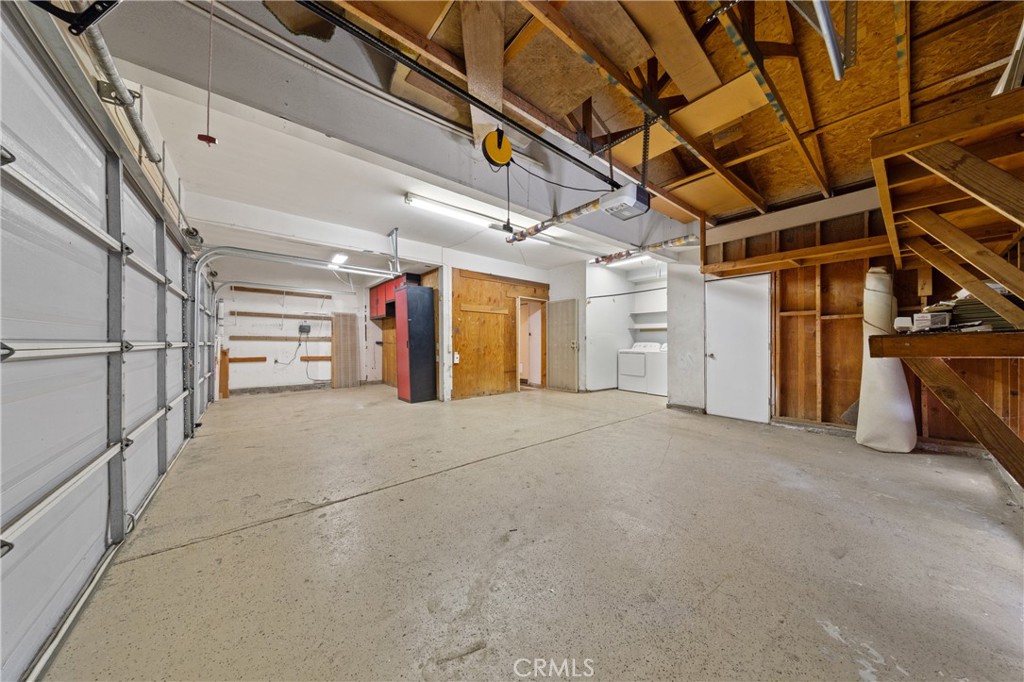 22678 Weatherly Court Wildomar, CA 92595 - Photo 49 of 54 Large 3-Car Garage With High Ceilings And Ample Storage Space