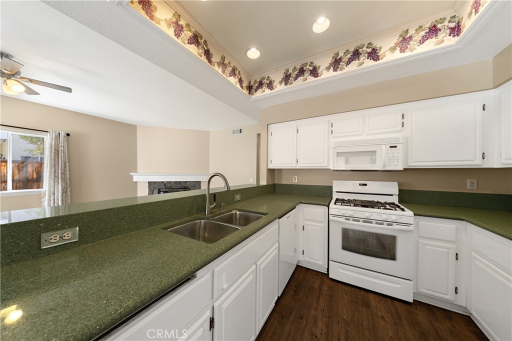 22678 Weatherly Court Wildomar, CA 92595 - Photo 5 of 54 Bright Kitchen With Recessed Lighting And Generous Countertops