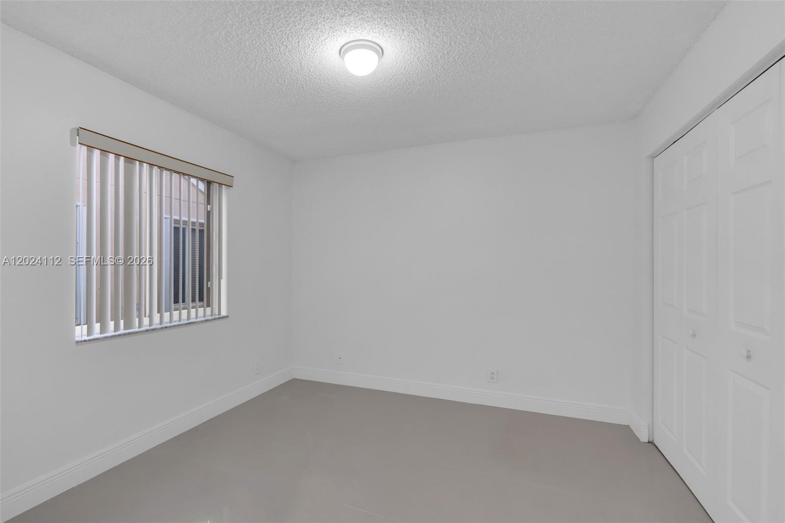 4366 Mahogany Ridge Drive Weston, FL 33331 - Photo 18 of 41 an empty room with a window