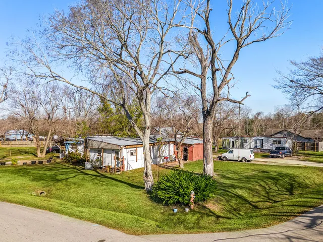 an aerial view of residential building and ocean