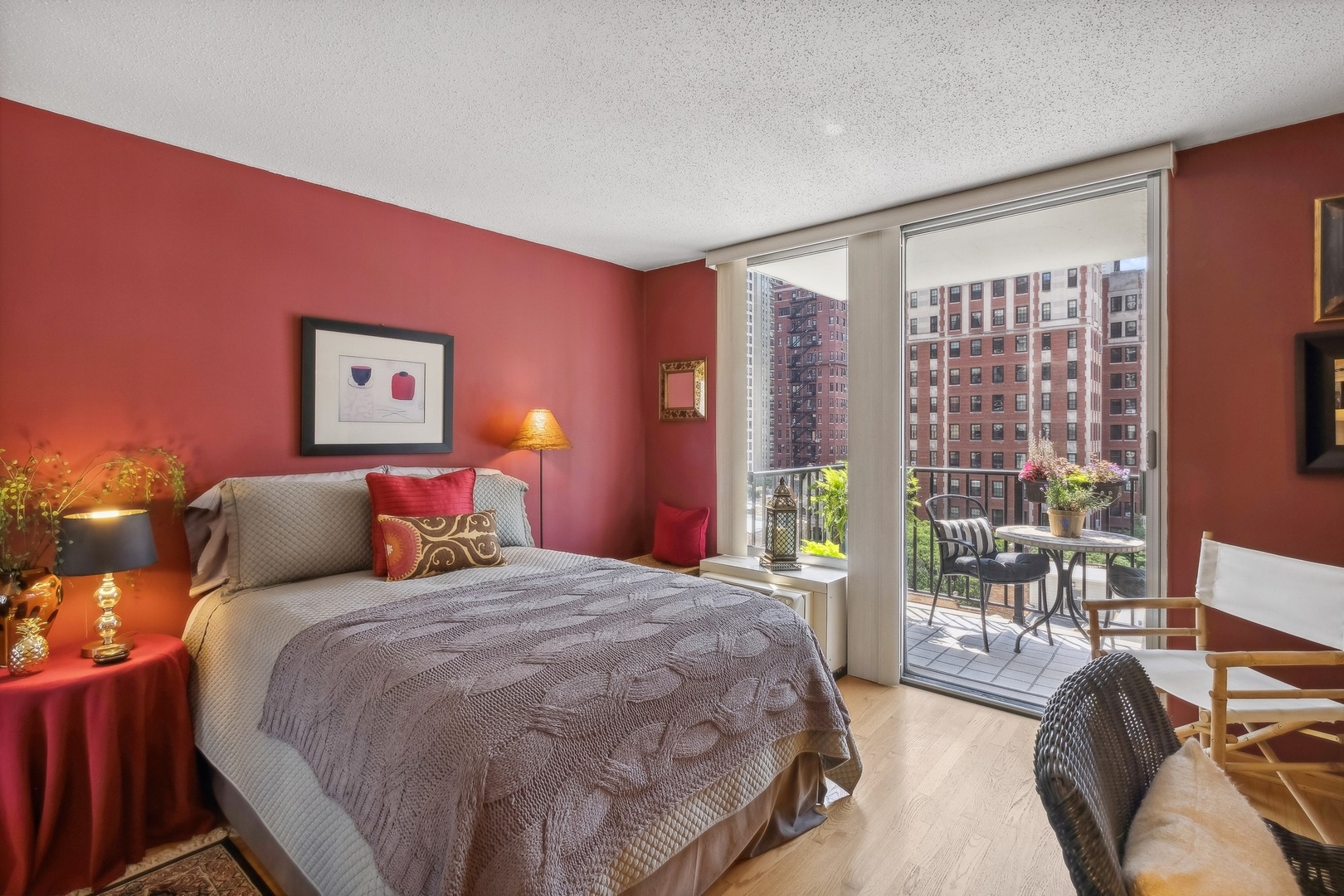 71 East Division Street, Unit 906 Chicago, IL 60611 - Photo 11 of 20 a bedroom with a bed and a large window