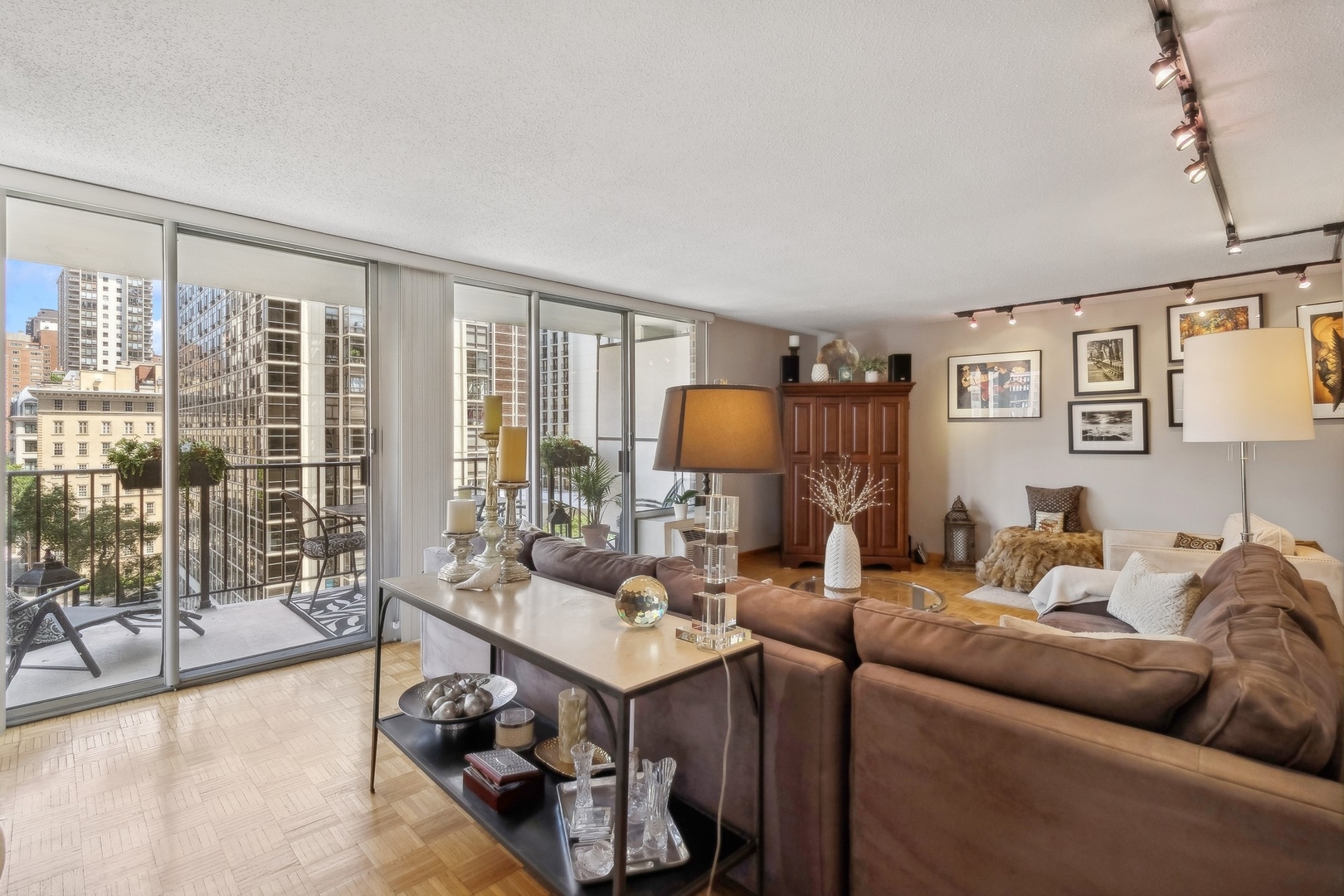 71 East Division Street, Unit 906 Chicago, IL 60611 - Photo 4 of 20 a living room with furniture and a floor to ceiling window