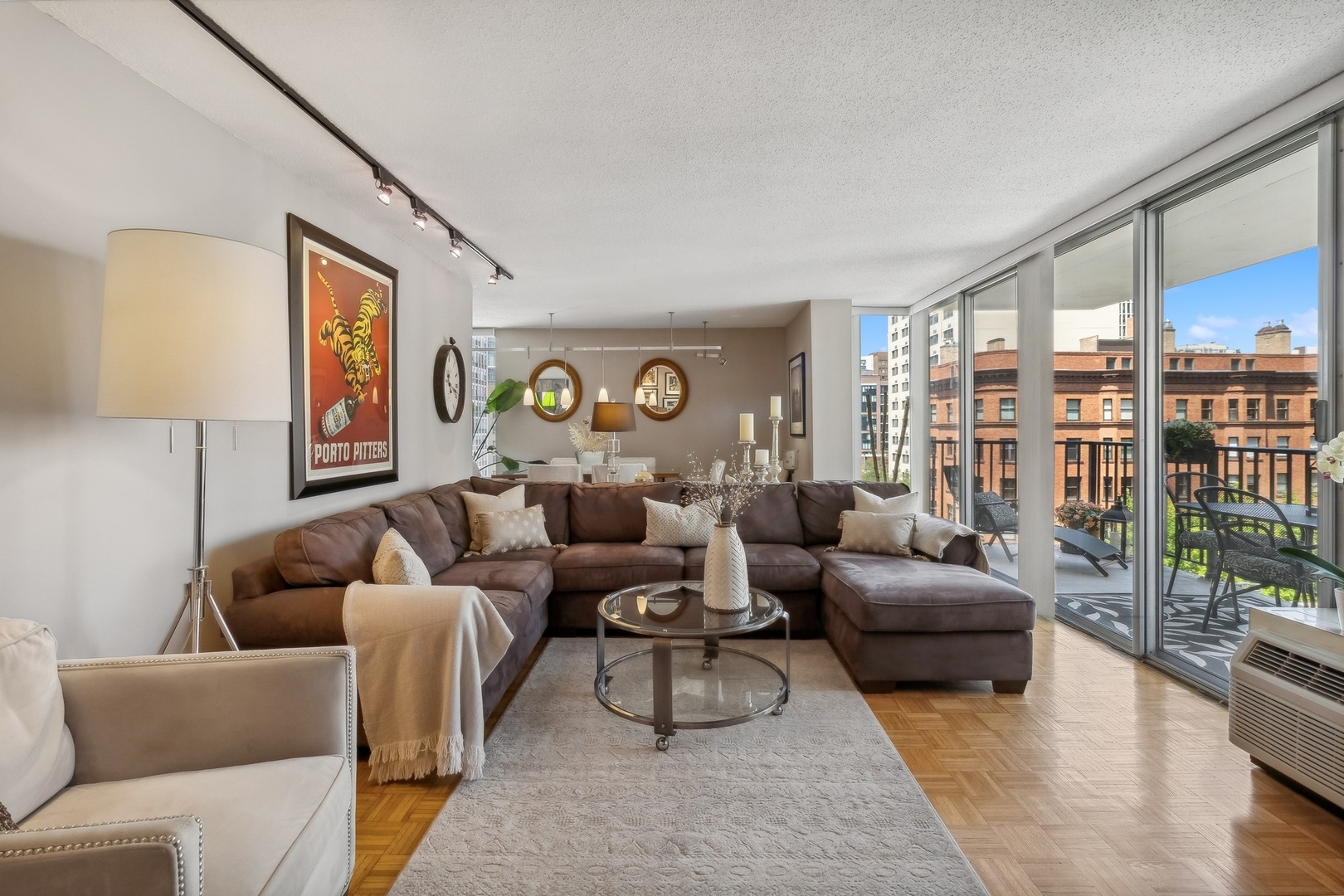 71 East Division Street, Unit 906 Chicago, IL 60611 - Photo 6 of 20 a living room with furniture and a window