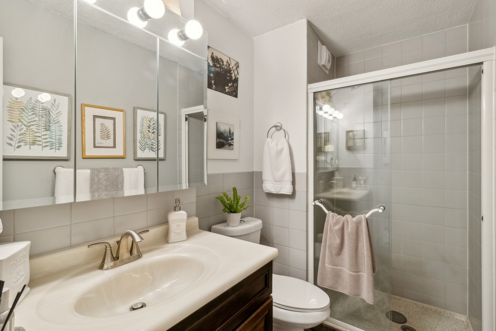 71 East Division Street, Unit 906 Chicago, IL 60611 - Photo 10 of 20 a bathroom with a sink toilet and shower