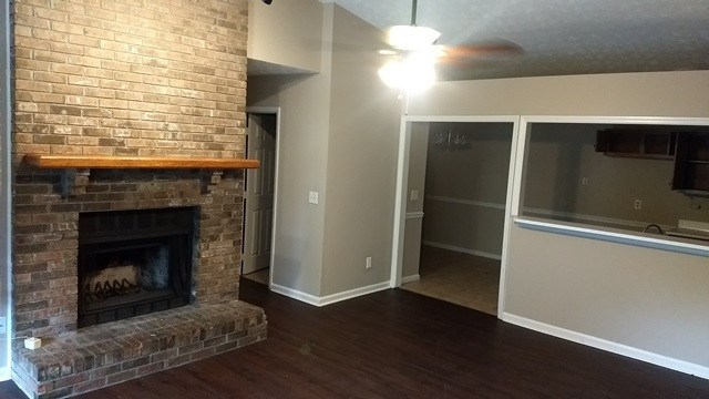 6233 Cross Tie Court Columbus, GA 31909 - Photo 2 of 7 a living room with a fireplace
