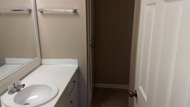 6233 Cross Tie Court Columbus, GA 31909 - Photo 5 of 7 a bathroom with a sink and a mirror
