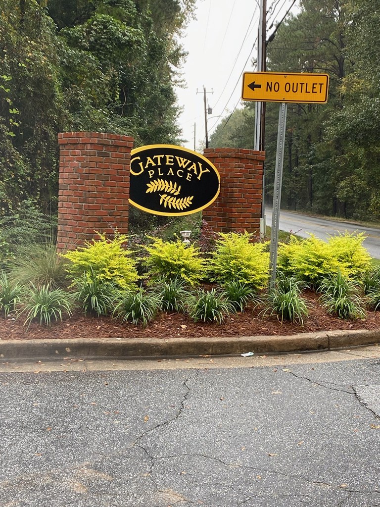 6233 Cross Tie Court Columbus, GA 31909 - Photo 7 of 7 a sign that is on a street sign